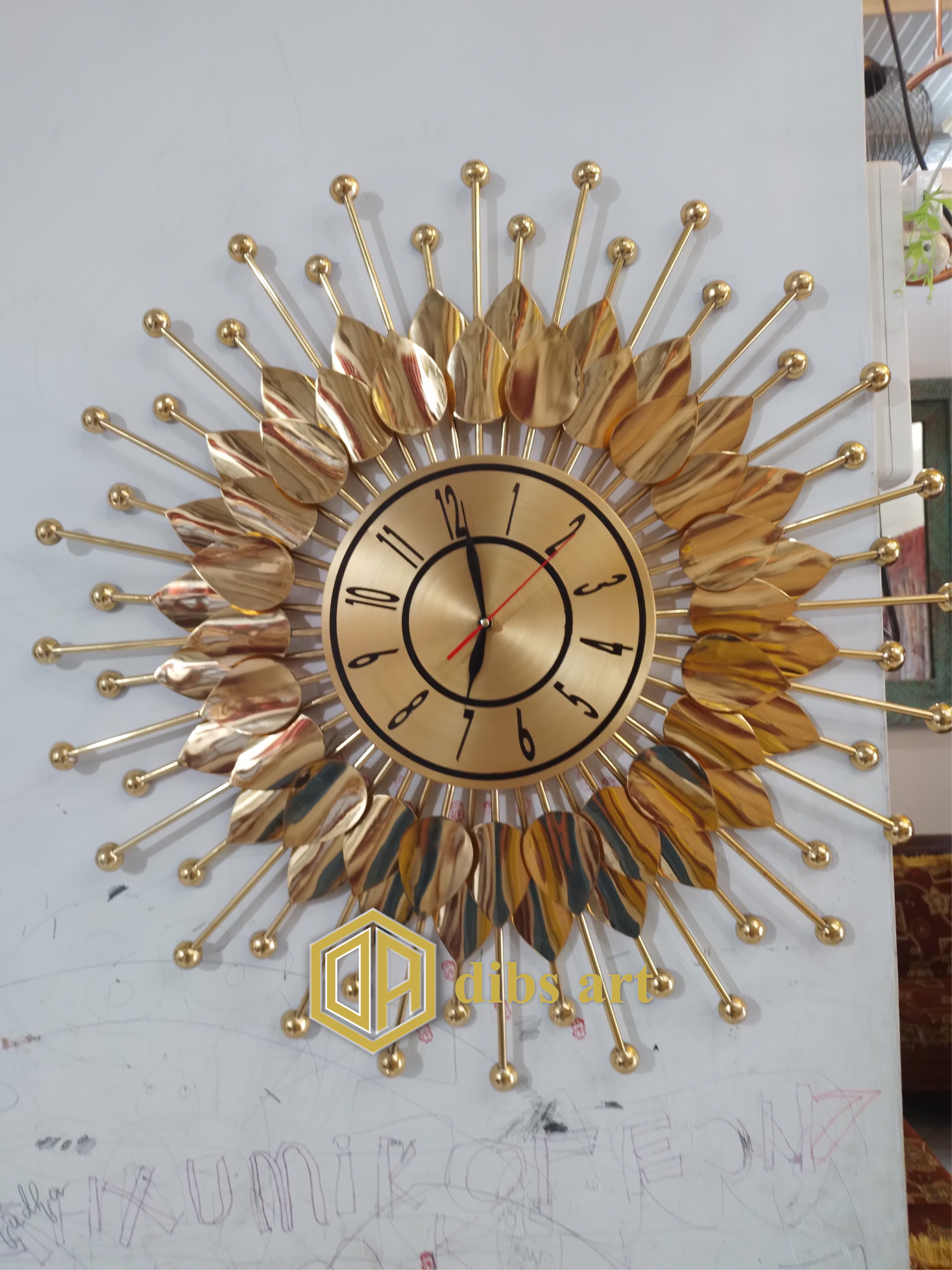 jam dinding kuningan modern