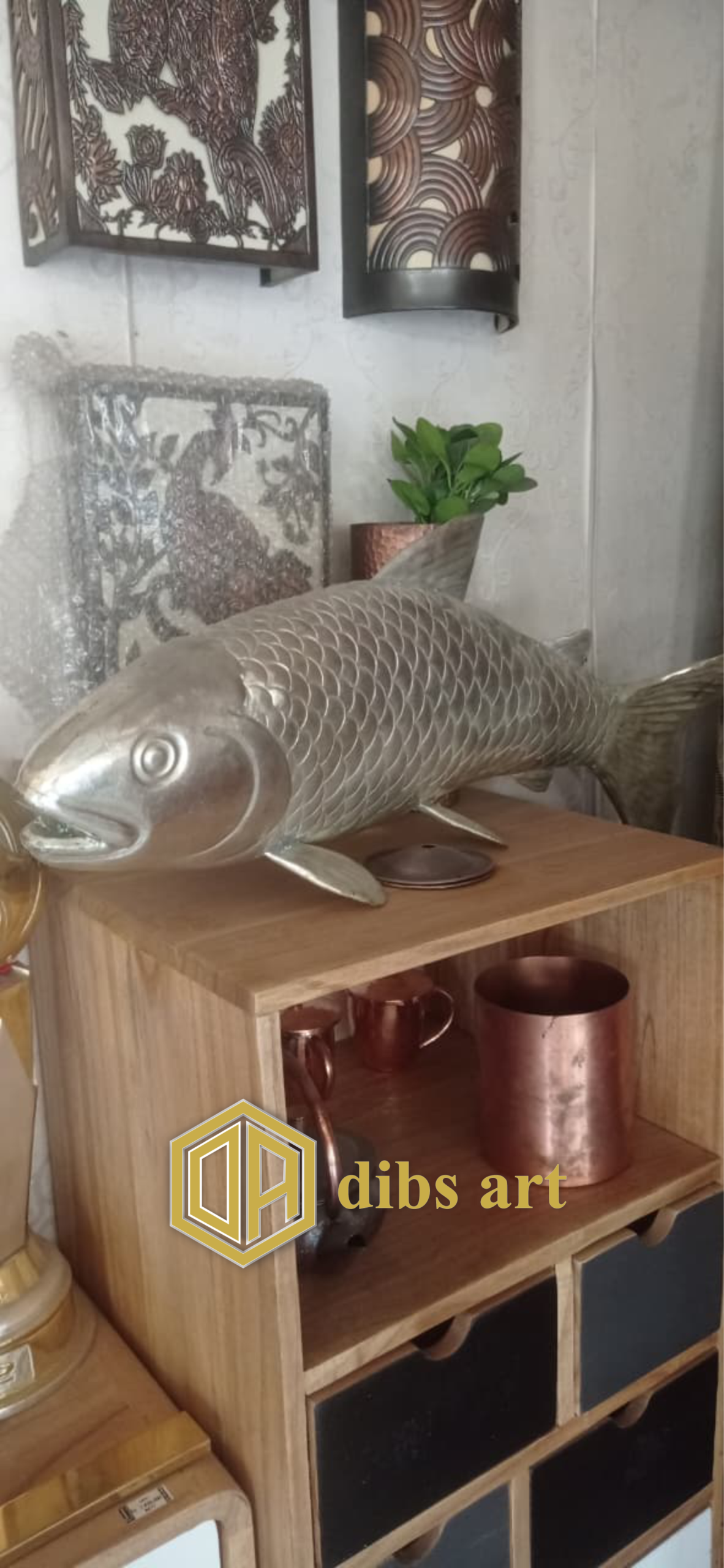 patung tembaga ikan