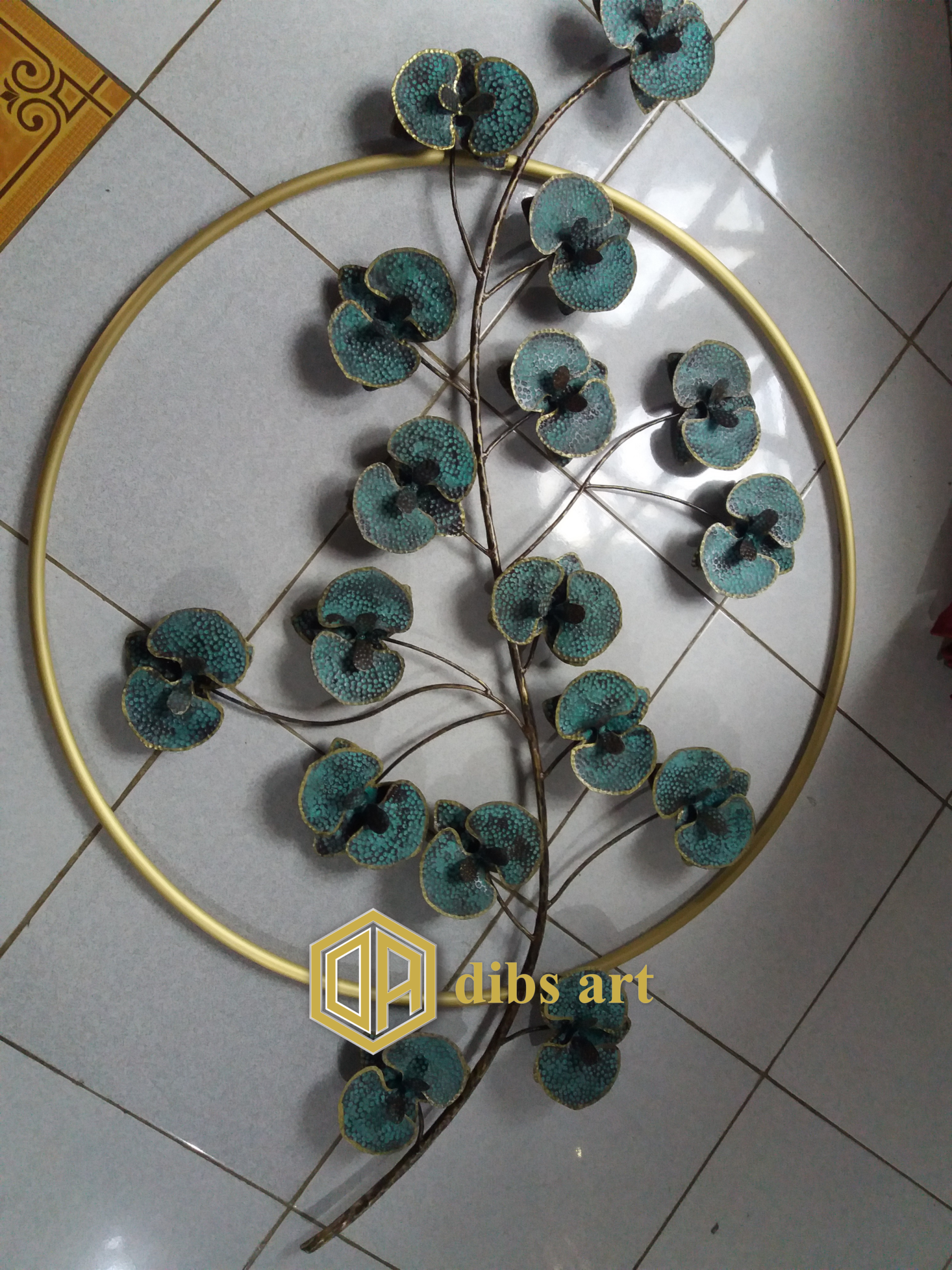 wall decor kuningan model daun