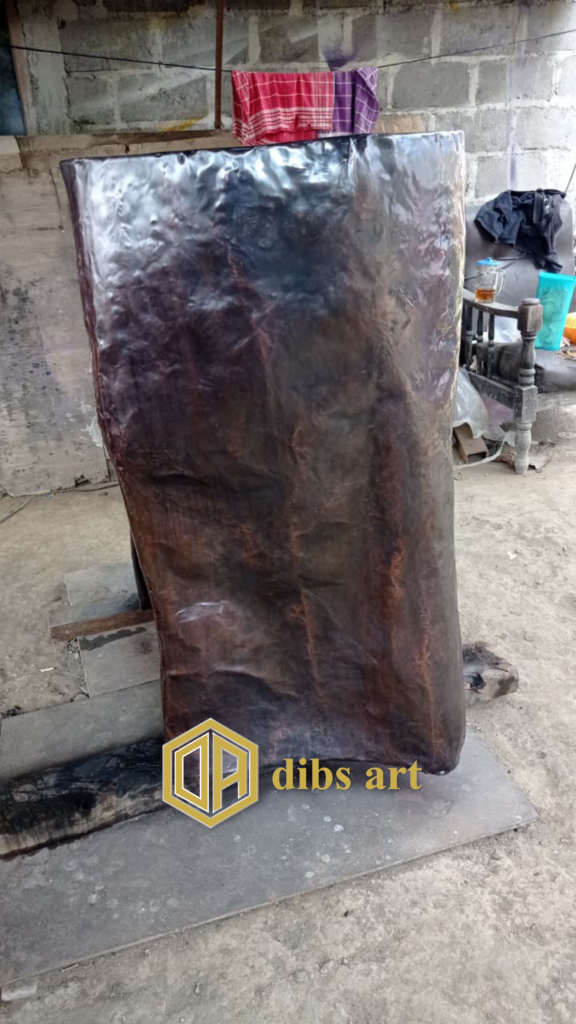 ornamen tembaga batu samping