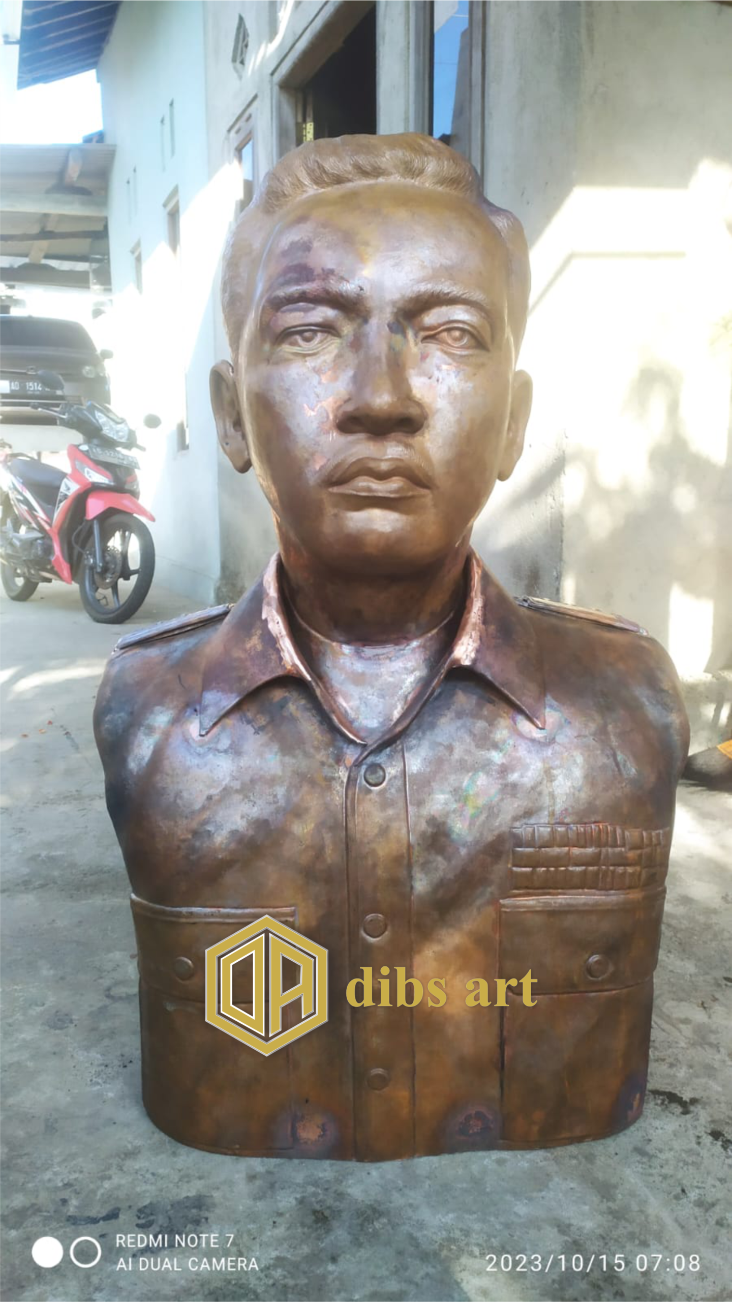 patung tembaga tokoh 2